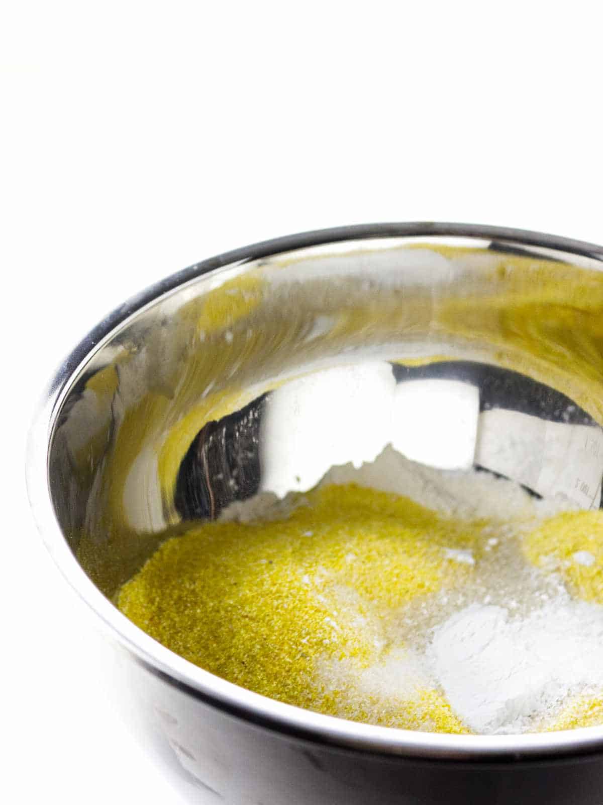 cornmeal and flour in a bowl.