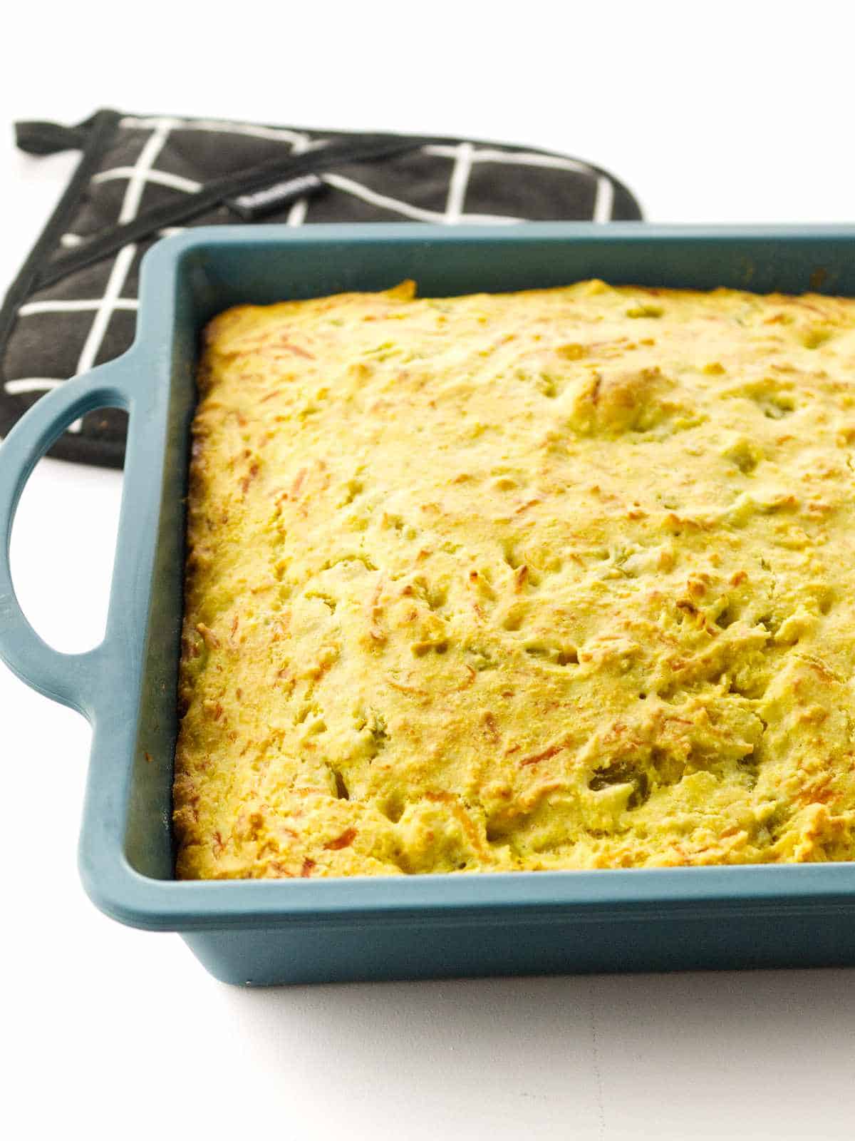 baked cajun cornbread in a pan.