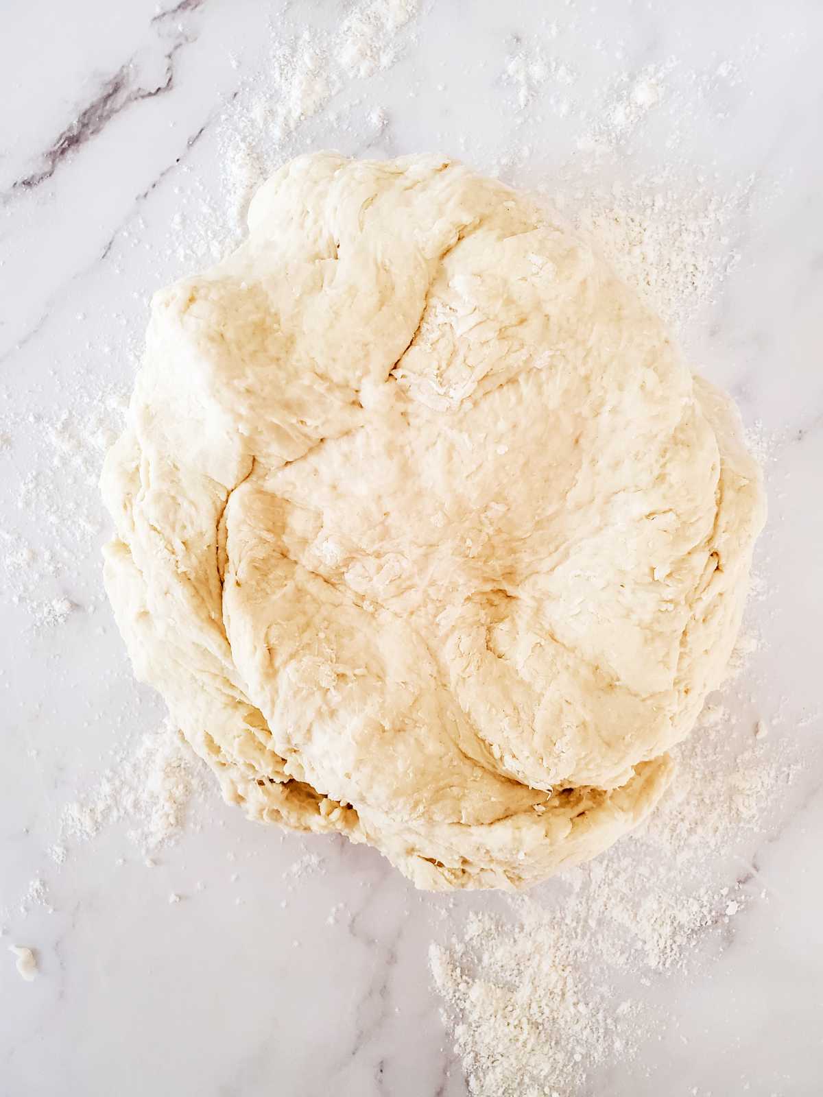 forming a ball of dough.