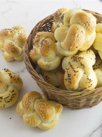 basket of challah rolls.