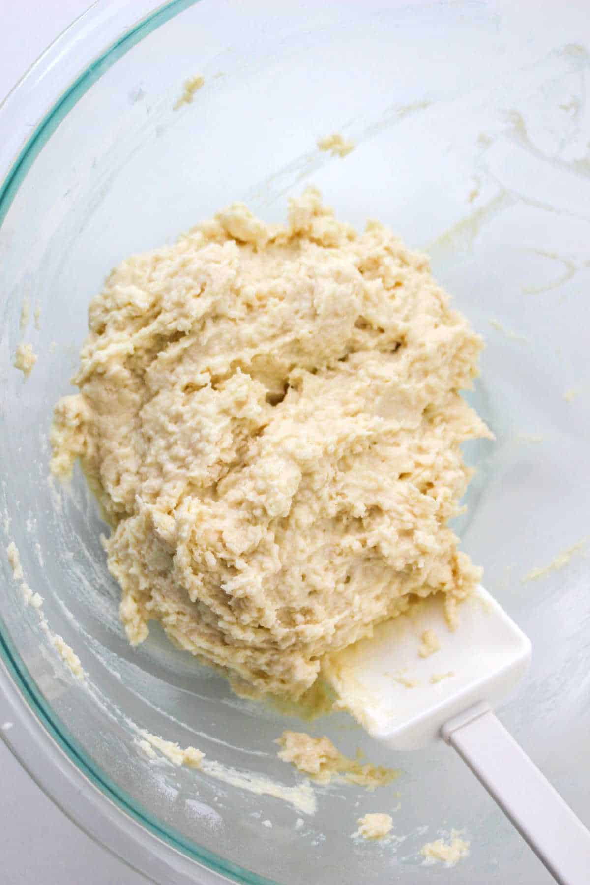 Mix the biscuit dough until JUST combined before turning out onto your work surface.