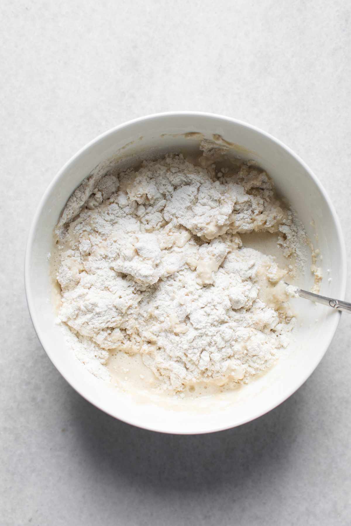 flour added to yeast and water for a shaggy dough.