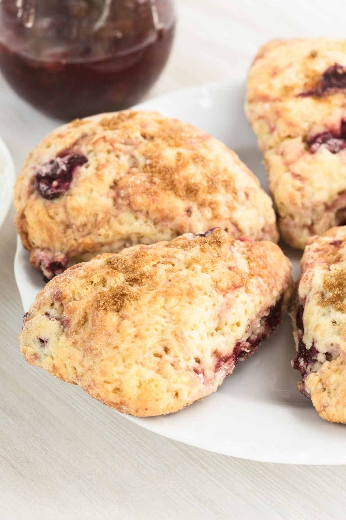 Homemade classic bakery, cream scones with cherry.