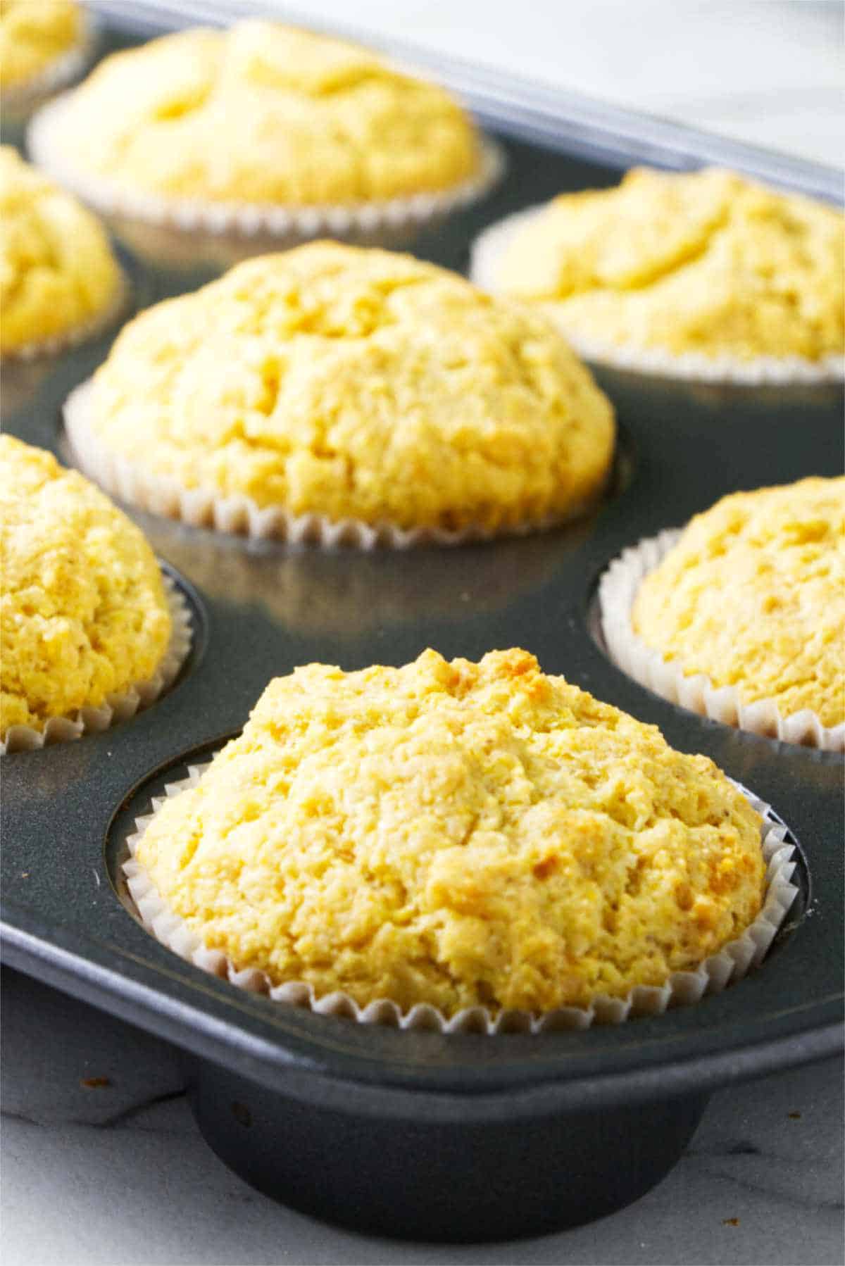 cornbread muffins in a muffin tin.