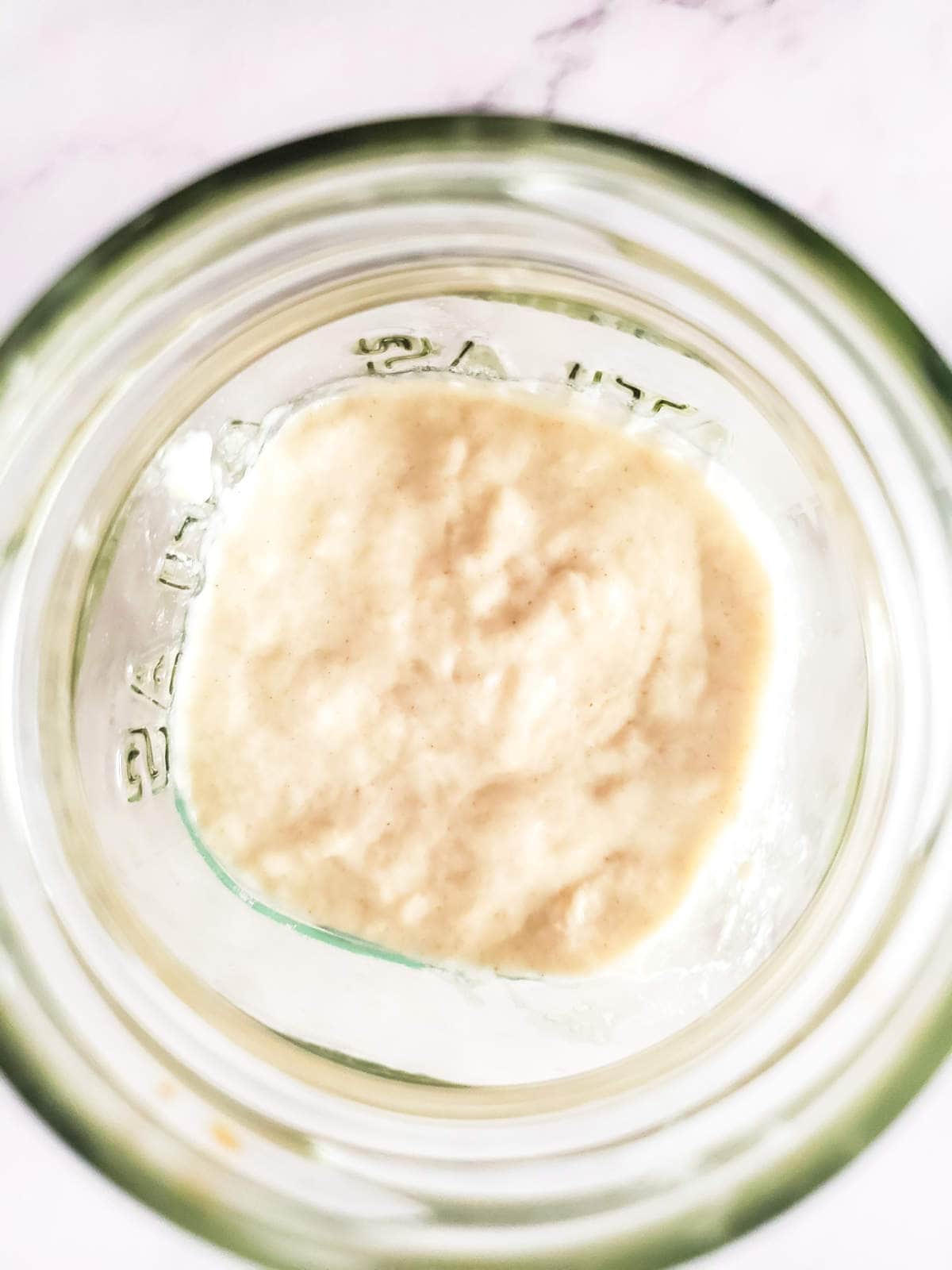 flour and water mixture in a jar.