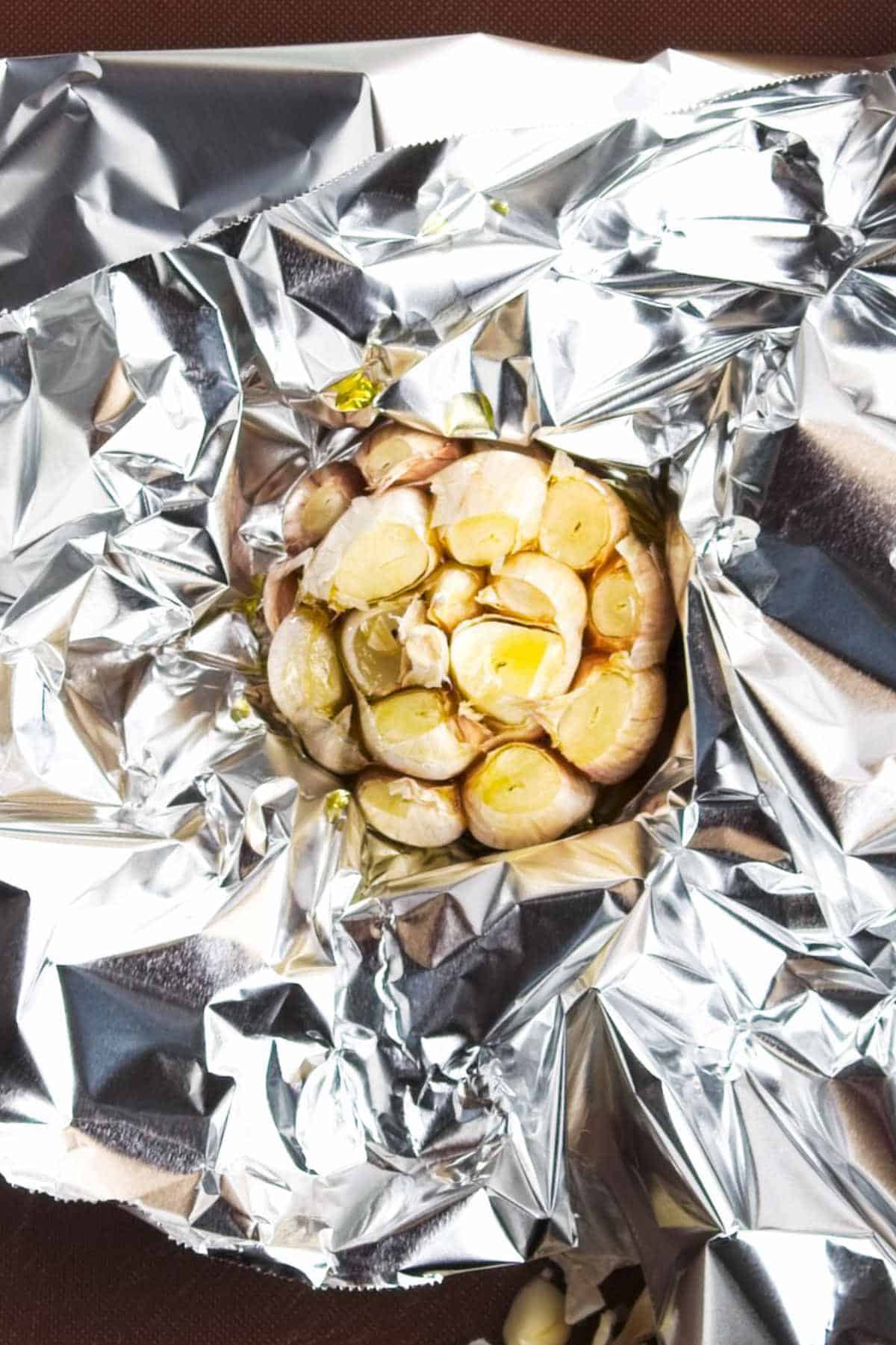 roasting garlic in a sheet of aluminum foil.