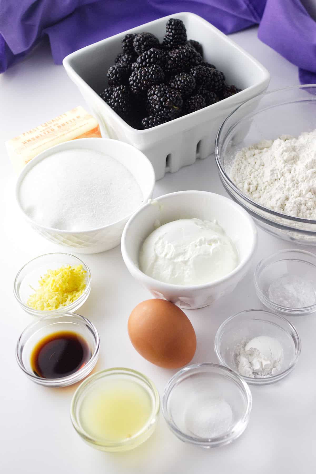 ingredients for making a glazed Lemon Blackberry loaf bread.