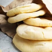 mini pita bread cooling on a towel.