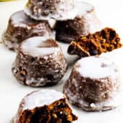 Old-fashioned Sailor Jack muffins with white glaze and a cut cake showing the spiced crumb.