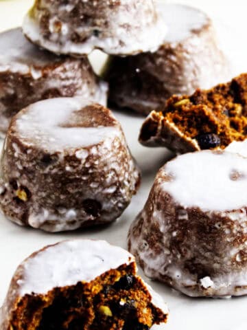 Old-fashioned Sailor Jack muffins with white glaze and a cut cake showing the spiced crumb.