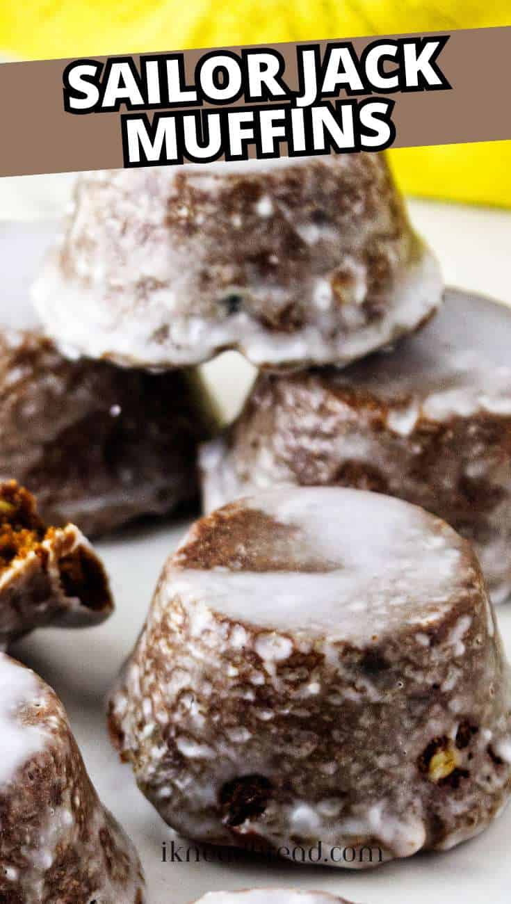 Glazed Sailor Jack spice muffins arranged together with one cake cut open to show the raisins and moist interior.